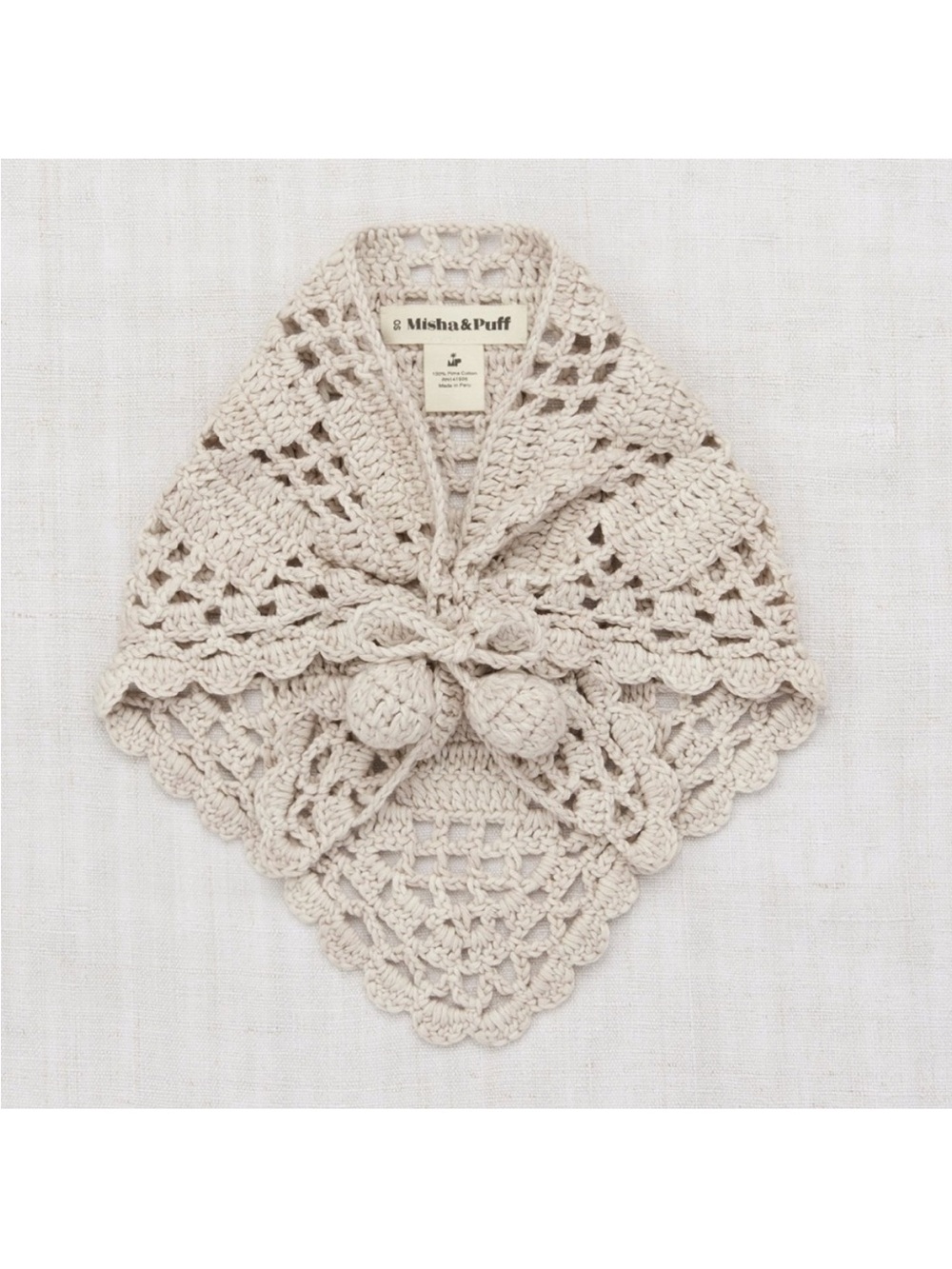 misha and puff crochet scarf with pom poms